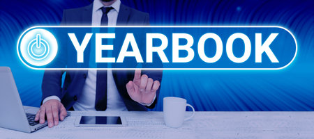 Text showing inspiration Yearbook. Internet Concept publication compiled by graduating class as a record of the years activitiesの写真素材