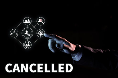 Hand writing sign Cancelled. Business approach decide or announce that planned event will not take placeの写真素材