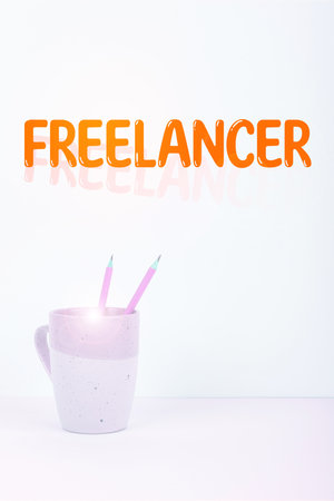Text showing inspiration Freelancer. Word Written on a person who acts independently without being affiliated with an organizationの写真素材