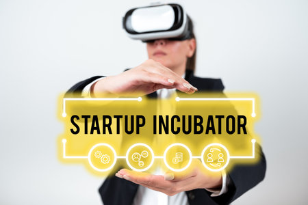 Sign displaying Startup Incubator. Word for Concept that can be used for financial gain of businessの写真素材