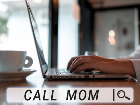 Sign displaying Call Mom. Conceptual photo Attempting to communicate with the mother using the smartphoneの写真素材