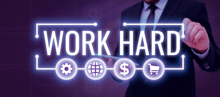 Text showing inspiration Work Hard. Business approach Laboring that puts effort into doing and...