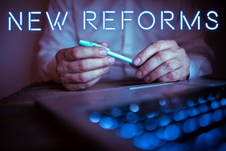 Text sign showing New Reforms. Concept meaning to amend or improve by change of form or removal of faultsの写真素材