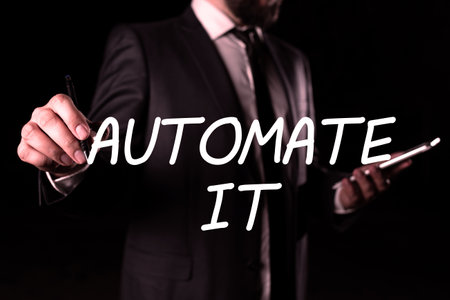 Sign displaying Automate It. Business approach convert process or facility to be operated automatic equipment.の写真素材