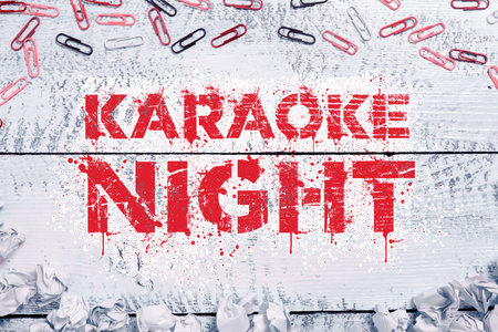 Text caption presenting Karaoke Night. Conceptual photo Entertainment singing along instrumental music played by a machineの写真素材