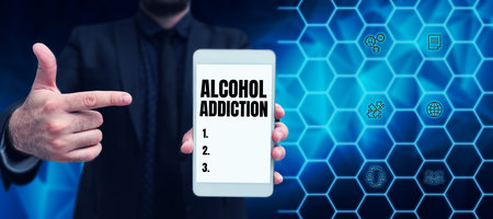 Conceptual caption Alcohol Addiction. Concept meaning characterized by frequent and excessive consumption of alcoholic beveragesの写真素材