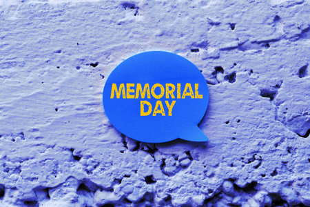 Text caption presenting Memorial Day. Word Written on To honor and remembering those who died in military serviceの写真素材