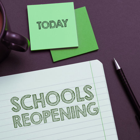Sign displaying Schools Reopening. Concept meaning classes are over for the time being End of the school dayの写真素材