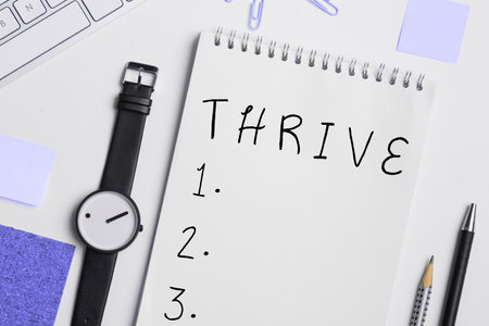 Text sign showing Thrive. Business overview Think positively Continue to prosper and flourish Time to Blossomの写真素材