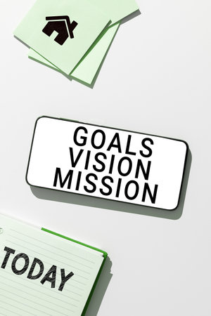 Writing displaying text Goals Vision Mission. Business concept practical planning process used to help community groupの写真素材
