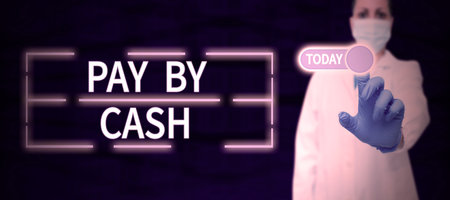 Conceptual caption Pay By Cash. Word for Customer paying with money coins bills Retail shoppingの写真素材