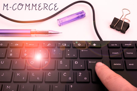Hand writing sign M Commerce. Business overview commercial transactions conducted electronically by...