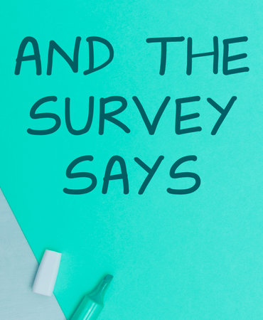 Handwriting text And The Survey Says. Concept meaning doing poll and bring the results discuss with othersの写真素材