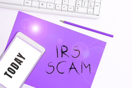 Hand writing sign Irs Scam. Business showcase targeted taxpayers by pretending to be Internal Revenue Serviceの写真素材