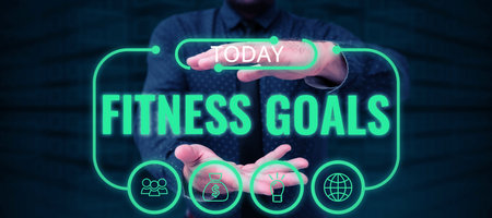 Sign displaying Fitness Goals. Business overview Loose fat Build muscle Getting stronger Conditioningの写真素材