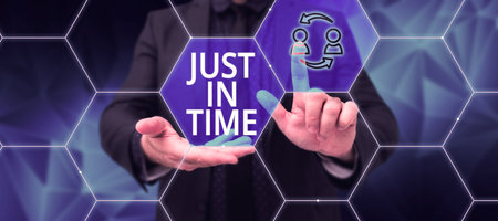 Sign displaying Just In Time. Internet Concept Arriving exactly at hour required Punctuality Responsibilityの写真素材