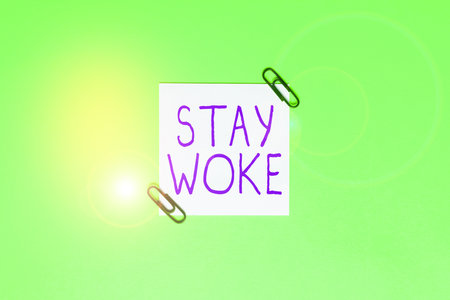 Conceptual display Stay Woke. Business approach being aware of your surroundings and things going on Keep informedの写真素材