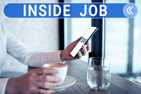 Handwriting text Inside Job. Conceptual photo done with the help of someone in a position within an organization or groupの写真素材