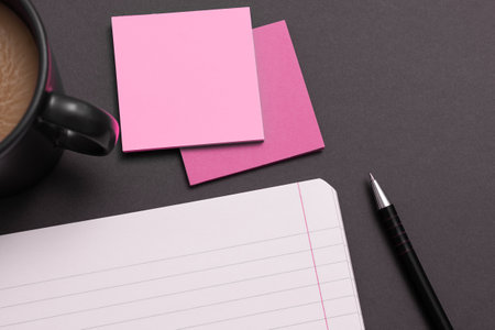 Notebook and Colored Papers Stickers Lying On White Desk. Multiple Assorted Collection Office...