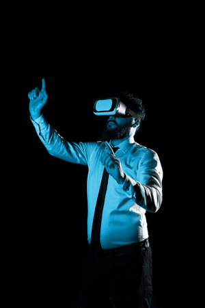 Man Wearing Vr Glasses And Pointing On Important Messages With two Fingers. Businessman Having...