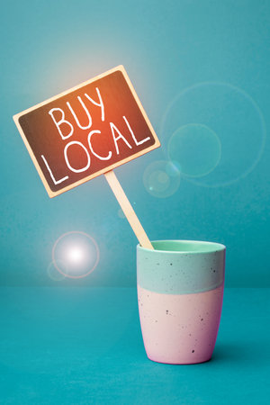Inspiration showing sign Buy Local. Internet Concept Patronizing products that is originaly made originaly or nativeの写真素材