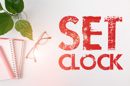 Text sign showing Set Clock. Internet Concept put it to the right time or change the clock time to a later timeの写真素材