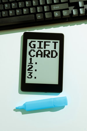 Text sign showing Gift Card. Word Written on A present usually made of paper that contains your messageの写真素材