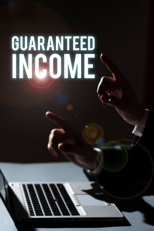Text showing inspiration Guaranteed Income. Conceptual photo earnings from property rental, and other enterprises for a certain periodの写真素材