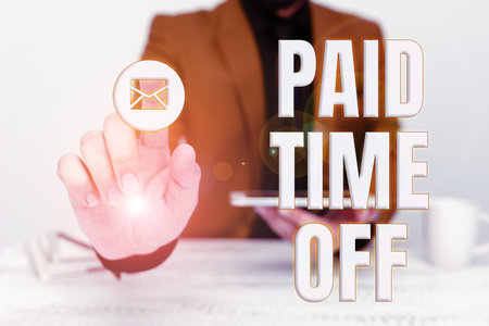 Hand writing sign Paid Time Off. Conceptual photo Receiving payments for not moments where you are not workingの写真素材