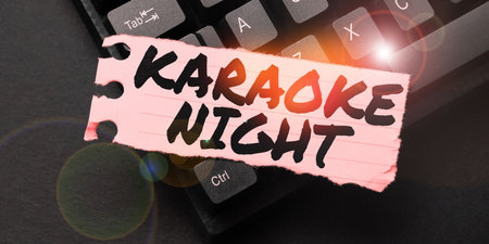 Writing displaying text Karaoke Night. Business approach Entertainment singing along instrumental music played by a machineの写真素材