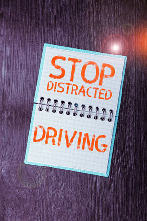 Text caption presenting Stop Distracted Driving. Business showcase asking to be careful behind wheel...