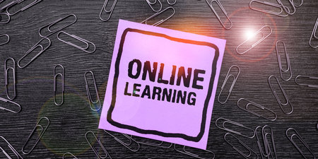 Text sign showing Online Learning. Word Written on Larning with the assistance of the Internet and a computerの写真素材