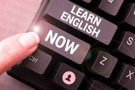 Text showing inspiration Learn English Now. Word Written on gain or acquire knowledge and skill of english languageの写真素材