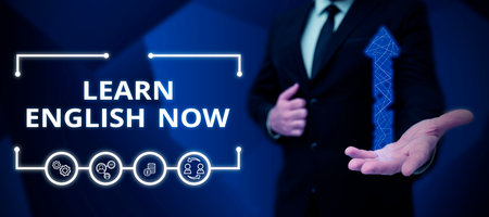 Text showing inspiration Learn English Now. Concept meaning gain or acquire knowledge and skill of english languageの写真素材