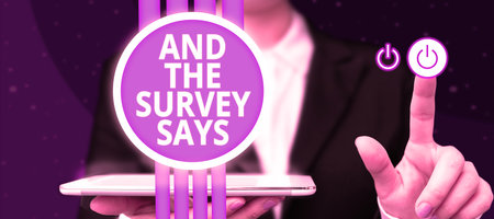 Writing displaying text And The Survey Says. Word Written on doing poll and bring the results...