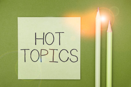 Text sign showing Hot Topics. Business concept subject that a lot of people are arguing and discussingの写真素材