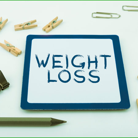 Text showing inspiration Weight Loss. Business showcase Decrease in Body Fluid Muscle Mass Reduce Fat Dispose Tissueの写真素材