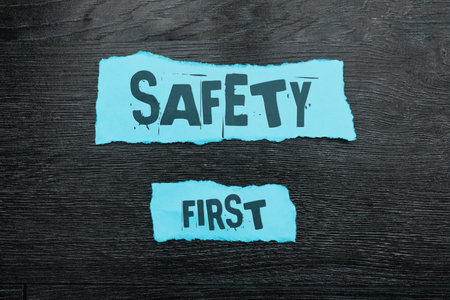 Text sign showing Safety First. Conceptual photo Avoid any unnecessary risk Live Safely Be Careful Pay attentionの写真素材