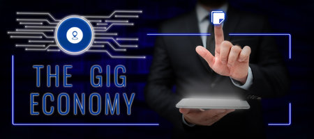 Sign displaying The Gig Economy. Business overview Market of Short-term contracts freelance work temporaryの写真素材
