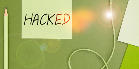 Text caption presenting Hacked. Word for Gain unauthorized access to data in system or computer Cyber crimeの写真素材