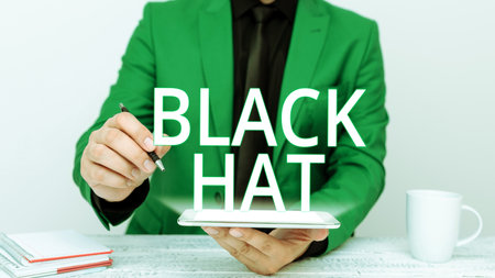 Handwriting text Black Hat. Concept meaning used in reference to a bad person especially a villain or criminalの写真素材