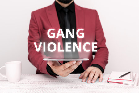 Text sign showing Gang Violence. Conceptual photo infringement of the laws caused by group of...