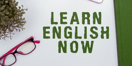 Conceptual caption Learn English Now. Word Written on gain or acquire knowledge and skill of english languageの写真素材