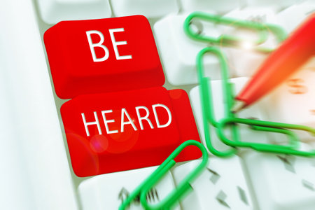 Hand writing sign Be Heard. Business showcase promote a state of complete emotional and physical well-beingの写真素材
