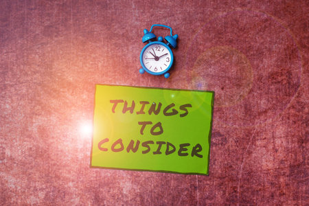 Hand writing sign Things To Consider. Business overview list to check or do it Shopping Schedule Time tableの写真素材