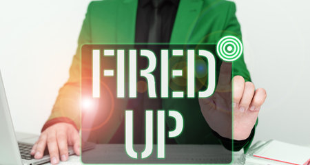 Text showing inspiration Fired Up. Concept meaning means that someone energized and in excited state about eventの写真素材