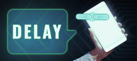 Text caption presenting Delay. Concept meaning Unplanned deferment of a scheduled activity because of some thingの写真素材