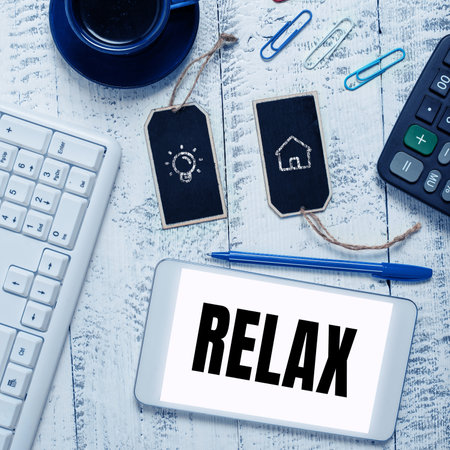 Hand writing sign Relax. Word for make or become less tense anxious calming down no restrictionsの写真素材