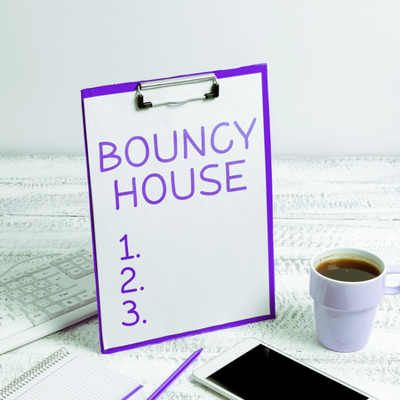 Hand writing sign Bouncy House. Word Written on Automated program that runs over the Internet Artificial intelligenceの写真素材