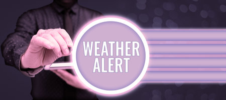Handwriting text Weather Alert. Business overview urgent warning on the state of the atmosphere at a place and timeの写真素材